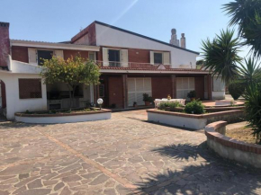 Porzione di villa immersa nel verde